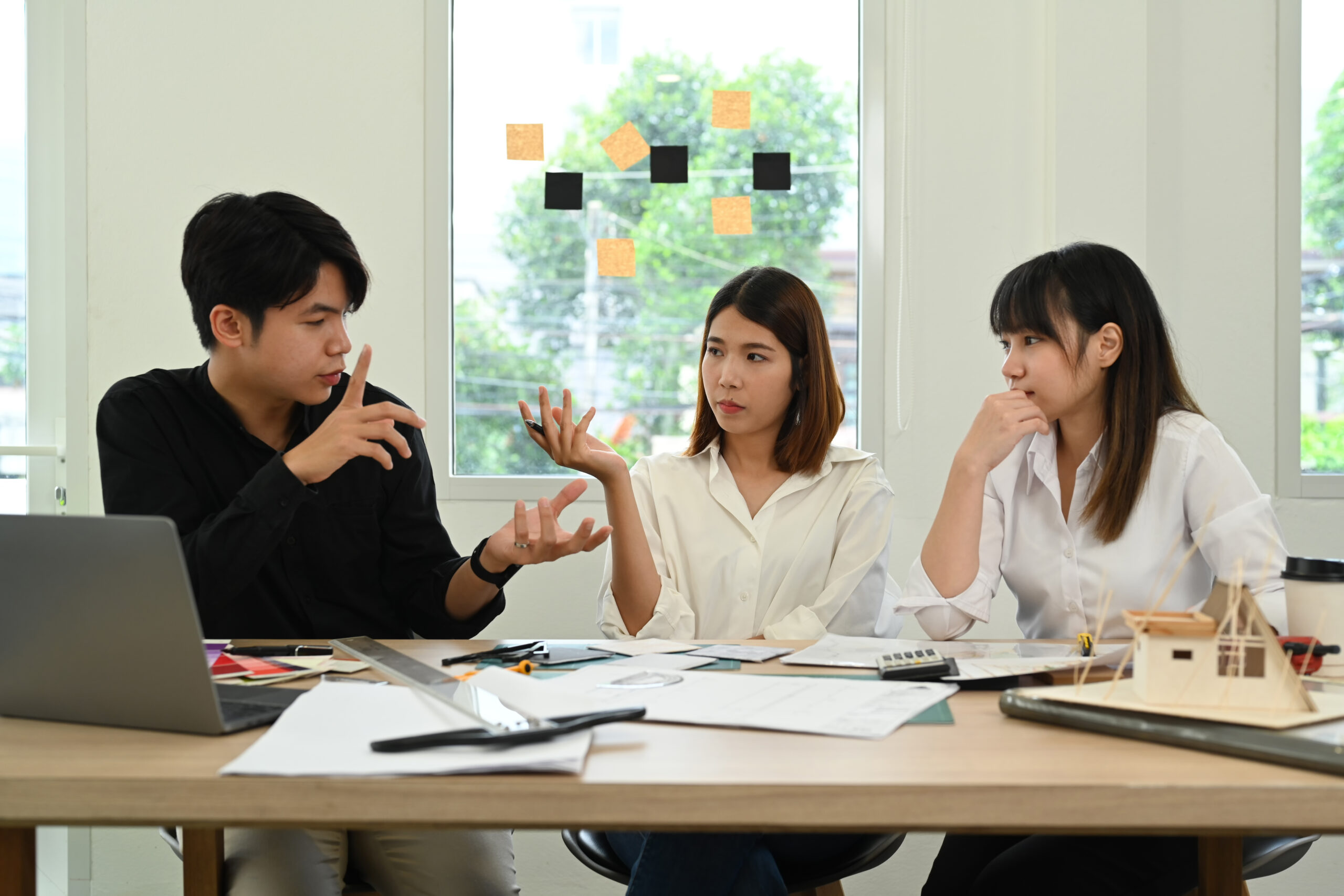 Group of creative people working together of architectural proje